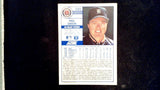 1989 Score #595a Paul Gibson Player grabbing crotch in background